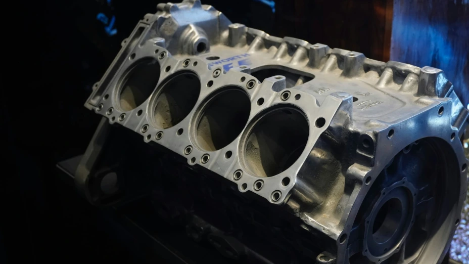 A close up of an engine block on a table